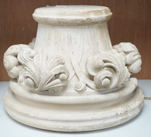 A reconstituted stone circular column base, 29cm diameter. Condition - fair